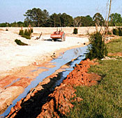 This ridge will be under three feet of water. The long narrow bar is designed to grow aquatic plants and the cuts adjacent are habitat for bass to stalk baitflsh which will live in the submersed plant beds. Diverse habitat.