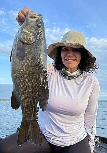 A healthy Great Lakes smallmouth that bit a marabou hair jig in shallow water.