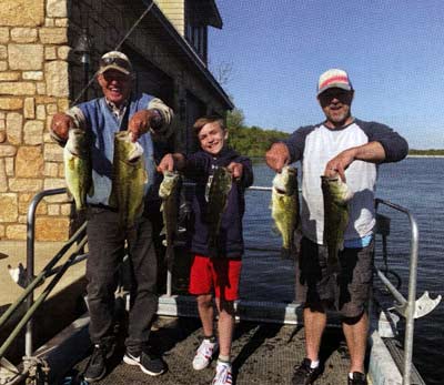 Greg, Deuce, and Jason show off the first round of the best Largemouth bass captured during the survey