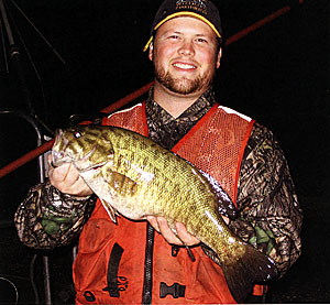 Justin VanDeHey holds a pretty smallmouth bass!