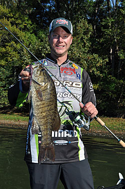 JVD with a monster river smallmouth that fell to a brown/purple Strike King Dream Shot worm. Photo Credit:  Jonathan LePera