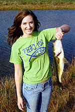 Hannah Rodgers holds a larger bass from the North Lake.