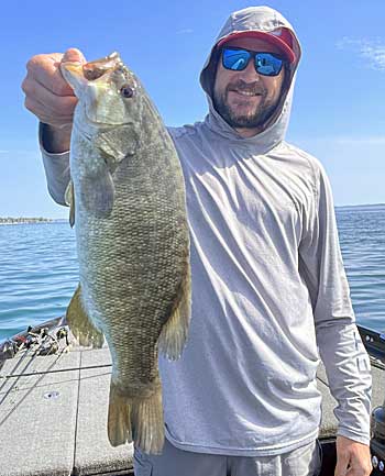 A solid smallmouth caught in the post-spawn around shallow rocks.