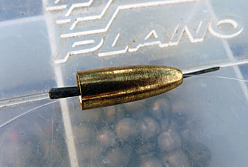 If you don't want to crimp a split shot on your line, you can use a rubber nail and a small bullet sinker.