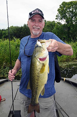 Ponds produce summertime action for both numbers of bass and quality bass such as this largemouth caught by Jack Davis.