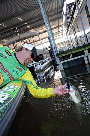 A black-and-blue swim jig with a green pumpkin craw is Tim Horton’s go-to lure for swimming along dock foam in the fall.