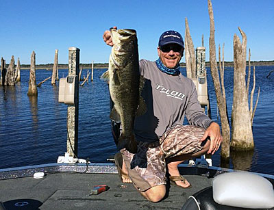 Catching trophy bass like the one Joe Balog is admiring requires specialized tackle, additional stealth and refined lure choices.