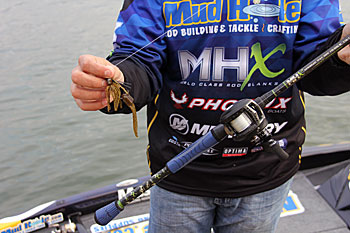 Tight-wobbling crankbaits and jerkbaits will help you slowly fish fast and find concentrations of wintertime bass. Once you find a school, a jig is tough to beat for picking it apart.