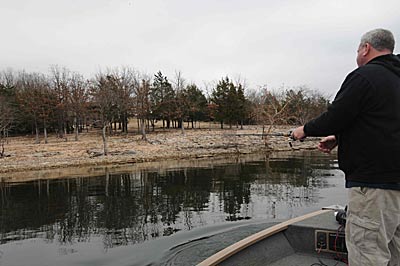 Guide Steve Dickey finds late winter bass along banks where rocks transition from one type of rock to another.