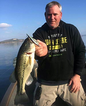 A suspending stickbait is one of Steve Dickey’s favorite lures when late winter bass stage on transition banks.