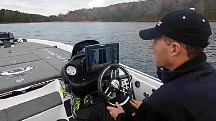 Aaron Martens scans his electronics to find bits and pieces of silted-in creek channels on aging reservoirs.