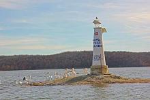 Originally home to 2 trees that appeared to stick up in the middle of the lake, “Two Tree Island” no longer has two trees, but instead plenty of birds, including Grand’s famous late autumn pelicans.